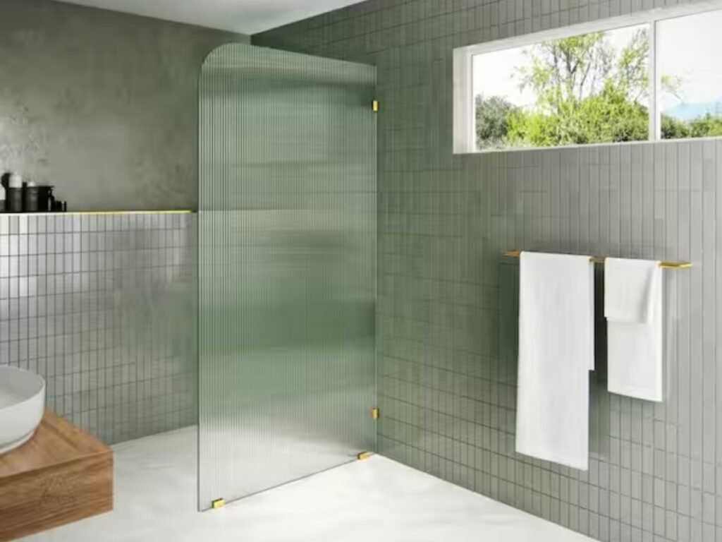 Glass shower enclosure