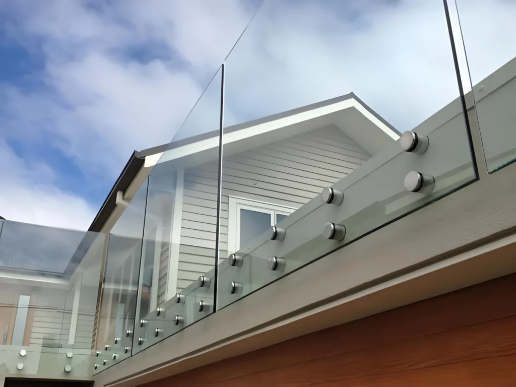 Standoff laminated glass railing detail